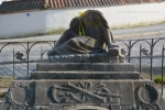 Headless grave monument